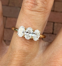 Three-Stone Round Brilliant Diamond Ring in White Metal Setting — listing 3