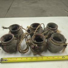 Cluster of Miniature Terracotta Pots Wrapped in Palm Leaf on Jute Rope Hanger — listing 3