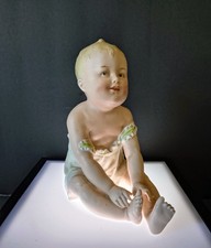 Antique German Bisque Piano Baby Figurine Seated in Green Bowl — listing 3