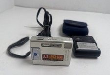 Konica Minolta DiMAGE X60 Ultra-Compact Digital Camera (Silver) — listing 5