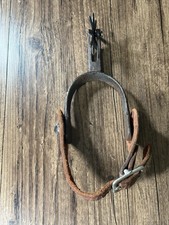 Antique Single Spur with Rowel and Curved Heel Band, Marked 'PfD'
