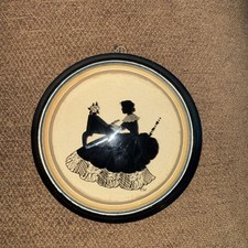 Pair of Antique Reverse-Painted Convex Glass Landscape Pictures in Oval Tiger-Grain Frames