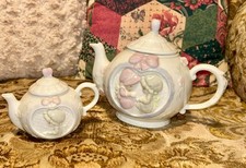 Precious Moments Style Ceramic Teapot with Boy and Girl Relief Design and Heart Finial — listing 4