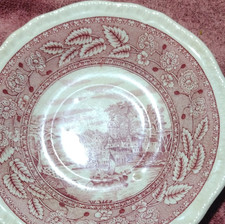 Ceramic item with red transfer-printed backstamp, maker unidentified (mark too blurred/smudged to read) — listing 4