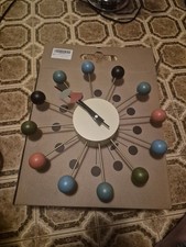 Mid-Century Modern Starburst Sunburst Wall Clock with Walnut Spikes Reproduction or unbranded — listing 5