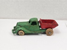 Cast Iron Toy Dump Truck with Nickel Driver and White Rubber Tires — listing 4