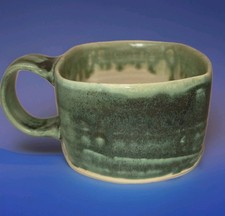 Handmade Studio Pottery Square Serving Bowl with Dark Green Glaze and Applied Shell Medallions — listing 4