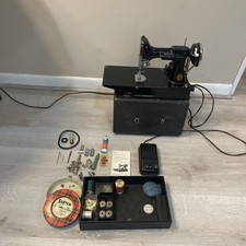 Singer Featherweight 221-1 Portable Electric Sewing Machine with Case and Accessories