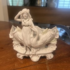 Vintage Bisque Porcelain Figurine of Seated Woman in Plumed Hat with Raised Leg — listing 3