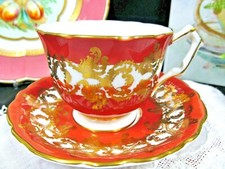 Porcelain Teacup and Saucer with Gold Scrolling Vine Pattern on Cream Ground — listing 2