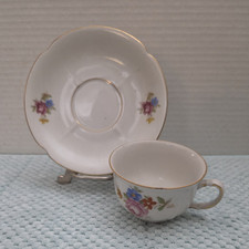 White Porcelain Footed Teacup with Embossed White Scrollwork Border and Platinum Trim — listing 6