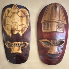 Hand-Carved Wooden Tribal Mask with Elongated Face and Geometric Scarification Motifs — listing 4