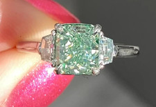 Three-Stone Round Brilliant Diamond Ring in White Metal Setting