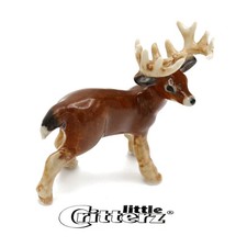 White Porcelain Reclining Deer and Fawn Figurine (Blanc de Chine style)