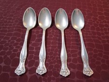 Set of 3 Ornate Silver-Plate Demitasse Teaspoons with Scrollwork Handles It's a name/logo I can't quite read — listing 5