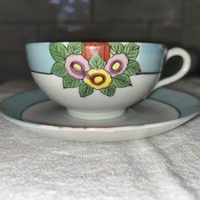 Vintage Lusterware Floral Teacup and Saucer with Heavy Gold Trim — listing 5