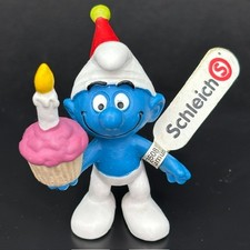 Vintage Baker Smurf Holding Red Cake with Whipped Cream PVC Figurine