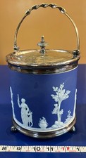 Antique Green Lithographed Tin Biscuit Tin with Neoclassical Cherub Jasperware Motif — listing 6
