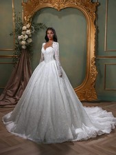 Long-Sleeve White Ruched Bridal Gown with Boat Neckline and High Slit — listing 6