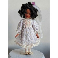 Lot of Assorted Dolls Including Boxed Porcelain Collector Doll, Nikki Doll, and Fashion Dolls