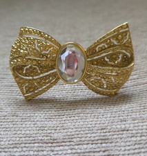 Vintage Retro Gold-Tone Scroll Bow Brooch with Clear Rhinestones and Baguettes — listing 5