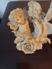 Porcelain Fairy Figurine Seated on Pink Lotus Flower with Green Butterfly Wings — listing 6