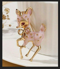 Vintage Gold-Tone Leaping Reindeer Christmas Brooch with Red Enamel Saddle
