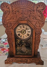 Antique Pressed Oak Gingerbread Mantel Clock with Roman Numeral Dial
