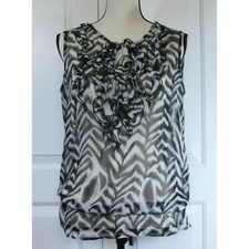 Grey Cap-Sleeve Tunic Dress with Zebra Ruffle and Grommet Shoulder Detail It says a Disney-related brand — listing 3