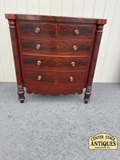 Antique American Empire Flame Mahogany Chest of Drawers with Carved Pineapple Columns and Paw Feet