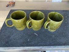 Set of 8 Mid-Century Avocado Green Ceramic Coffee Mugs with White Interior — listing 5