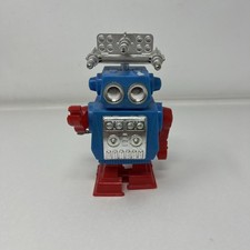 Vintage Wind-Up Walking Space Robot, Cream Plastic with Litho Chest Panel, Made in Hong Kong — listing 5