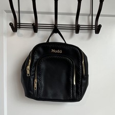 Black Nylon and Faux Leather Flap-Top Mini Backpack with Zip Front Pocket Yes - logo stamped on hardware/zippers — listing 6