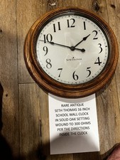 Seth Thomas Reproduction Schoolhouse Regulator Wall Clock, Black Frame — listing 4
