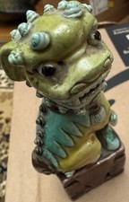 Collection of Chinese Ceramic Figurines - Foo Dogs, Robed Ladies, and Animal Figures