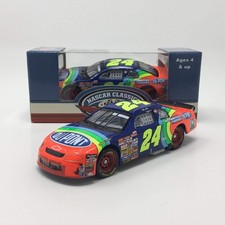 Jeff Gordon #24 DuPont Monte Carlo NASCAR Plaque with Authentic Race-Used Tire Piece
