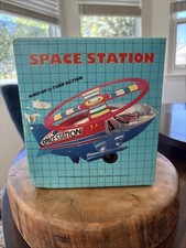 Vintage Tin Litho Wind-Up Space Ship with Trailing Flying Saucers Toy
