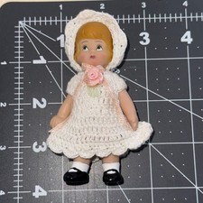 Daisy Kingdom Porcelain Christmas 'Noel' Doll with Bonnet and Apron — listing 6