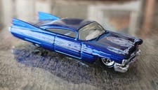 Hot Wheels Cadillac Seville Lowrider, Metalflake Maroon with White Pinstripe Panels — listing 4