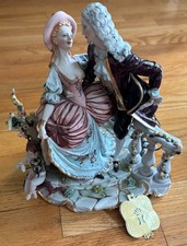 Italian Porcelain Figurine of a Girl Artist Painter with Easel and Framed Paintings — listing 3