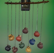 Cluster of Miniature Terracotta Pots Wrapped in Palm Leaf on Jute Rope Hanger — listing 2