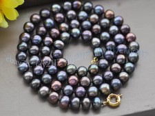 Beaded Necklace with Peacock Freshwater Pearls and Cream Tube Beads