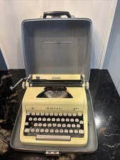 Royal Quiet De Luxe Portable Typewriter with Case and Accessories