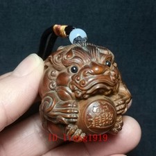 Carved Netsuke-Style Figure of Crouching Man Holding a Lantern Heavy, cool, dense — likely bone or ivor — listing 2
