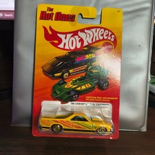 Hot Wheels Chevy El Camino Style Diecast Car with Blue Wheels and Graphics — listing 4