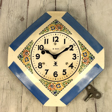 Howard Miller Westminster Chime Wall Clock with Broken-Arch Pediment and Urn Finial Key-wound mechanical — listing 6