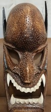 Hand-Carved Wooden Tribal Mask with Elongated Face and Geometric Scarification Motifs — listing 2