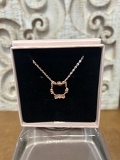 Gold-Tone Rhinestone Pendant Necklace with Faceted Red Diamond-Shaped Stone