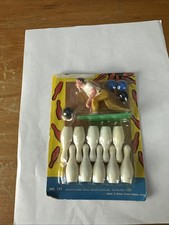 Vintage Plastic Children's Bowling Set with 10 Multicolor Pins and 2 Black Balls