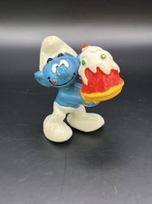 Vintage Smurf PVC Figurine Holding Cake with Cherry — listing 5